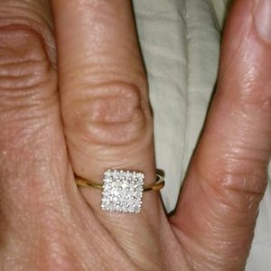 10k diamond ring.****   Size 7
